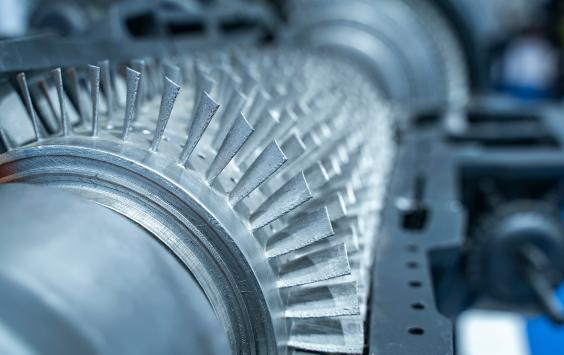 Close up picture of grey industrial turbine