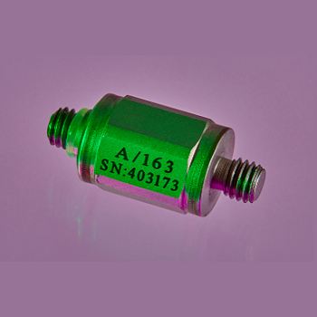 An A/163 accelerometer shot in purple background
