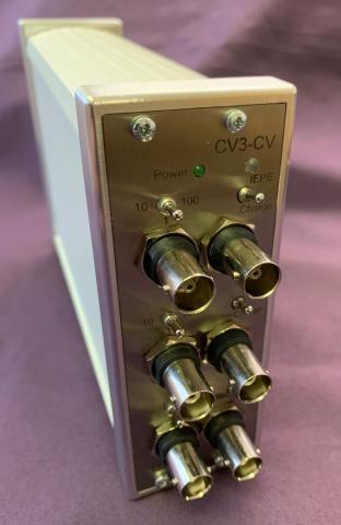 A close up shot of a 3 channel charge amplifier 