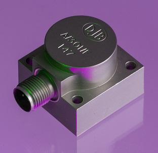 A close up shot of an A/301 accelerometer in a purple background