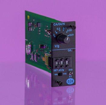a green circuit board, charge amplifier
