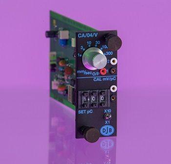 Circuit board looking green and black charge amplifier