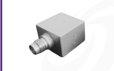 Cut-out image of DJB AT/04 piezoelectric triaxial accelerometer on white background