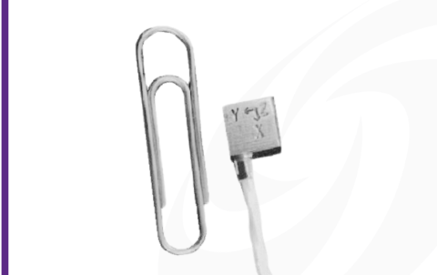 Cut-out image of DJB AT/18 ultra miniature triaxial IEPE accelerometer on white background