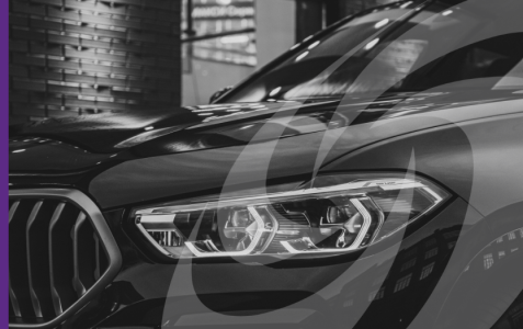 Black and white close up of premium car headlights