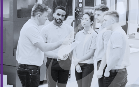 Group of people on a factory floor