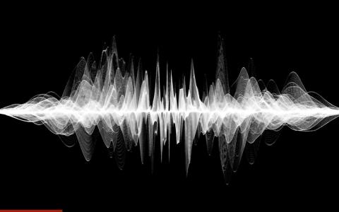 Abstract white sound wave on a black background, in black and white.