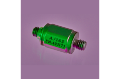 An A/163 accelerometer shot in purple background