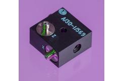 An A/30 dark cubed accelerometer shot in purple background