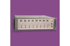 A grey filter box with buttons at the front 