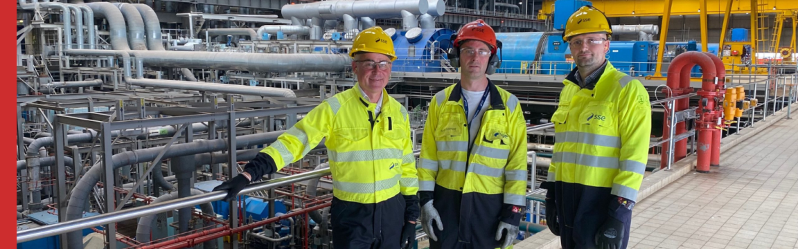 Group of engineers in hard hats and hi viz on SSE Thermal Power Station in Peterhead