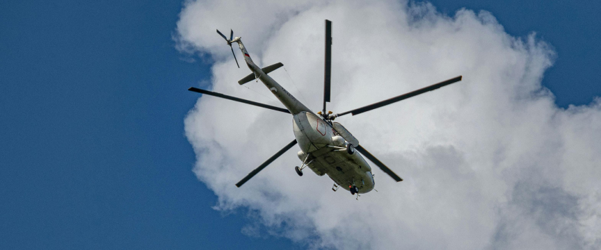 Helicopter in the air - view from below
