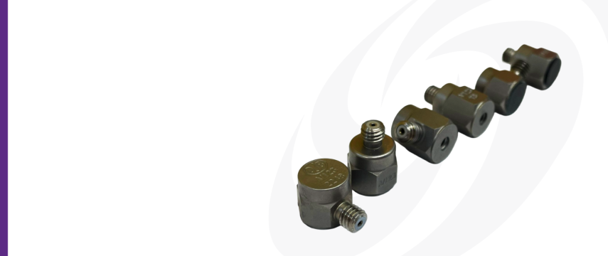 Line up of DJB A/123 mono-axial IEPE accelerometers showing the different options: side entry, top entry, tapped base and ceramic isolated base