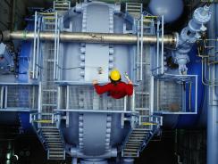beran-person-looking-down-inside-power-station.jpg
