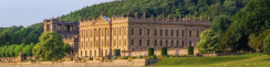External view of Chatsworth House and grounds on a sunny day