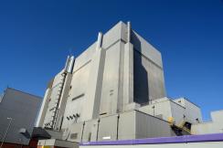 Heysham 1 and 2 Nuclear Power Stations. External view with blue sky background.