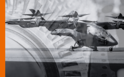 Aircraft overlaid on a close up of power station turbine in black and white