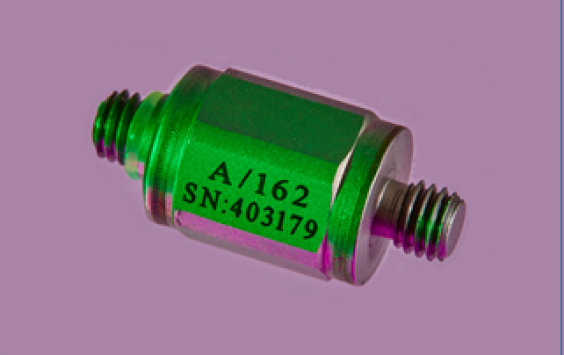 An A/162 accelerometer shot in purple background
