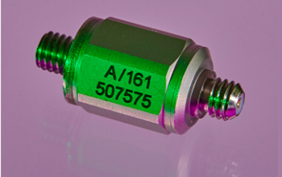 An A/161 accelerometer shot in purple background