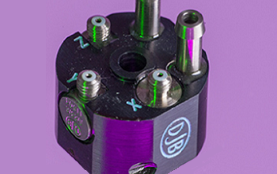 A close up shot of an A/33 accelerometer