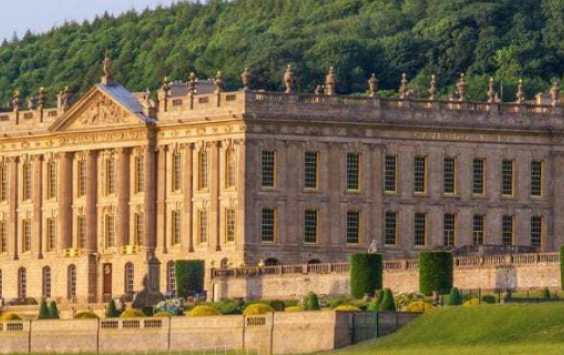 External view of Chatsworth House and grounds on a sunny day