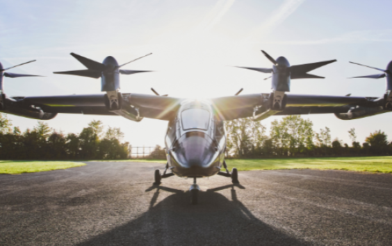 Facing a helicopter on the ground with the sun shining behind