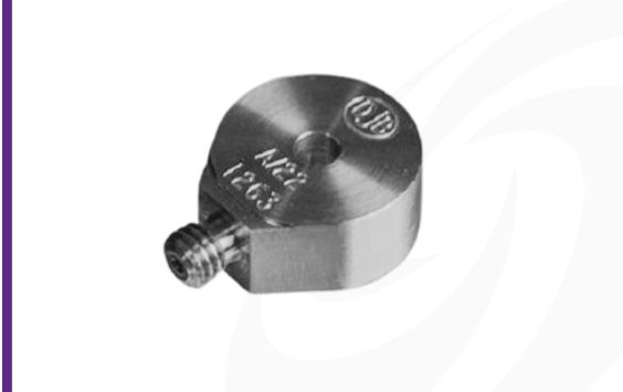 Cut-out image of DJB A/22 piezoelectric accelerometer on white background