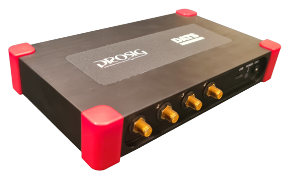 Image of a black DATS Solo device with red corners, showing 4 SMA connectors. 